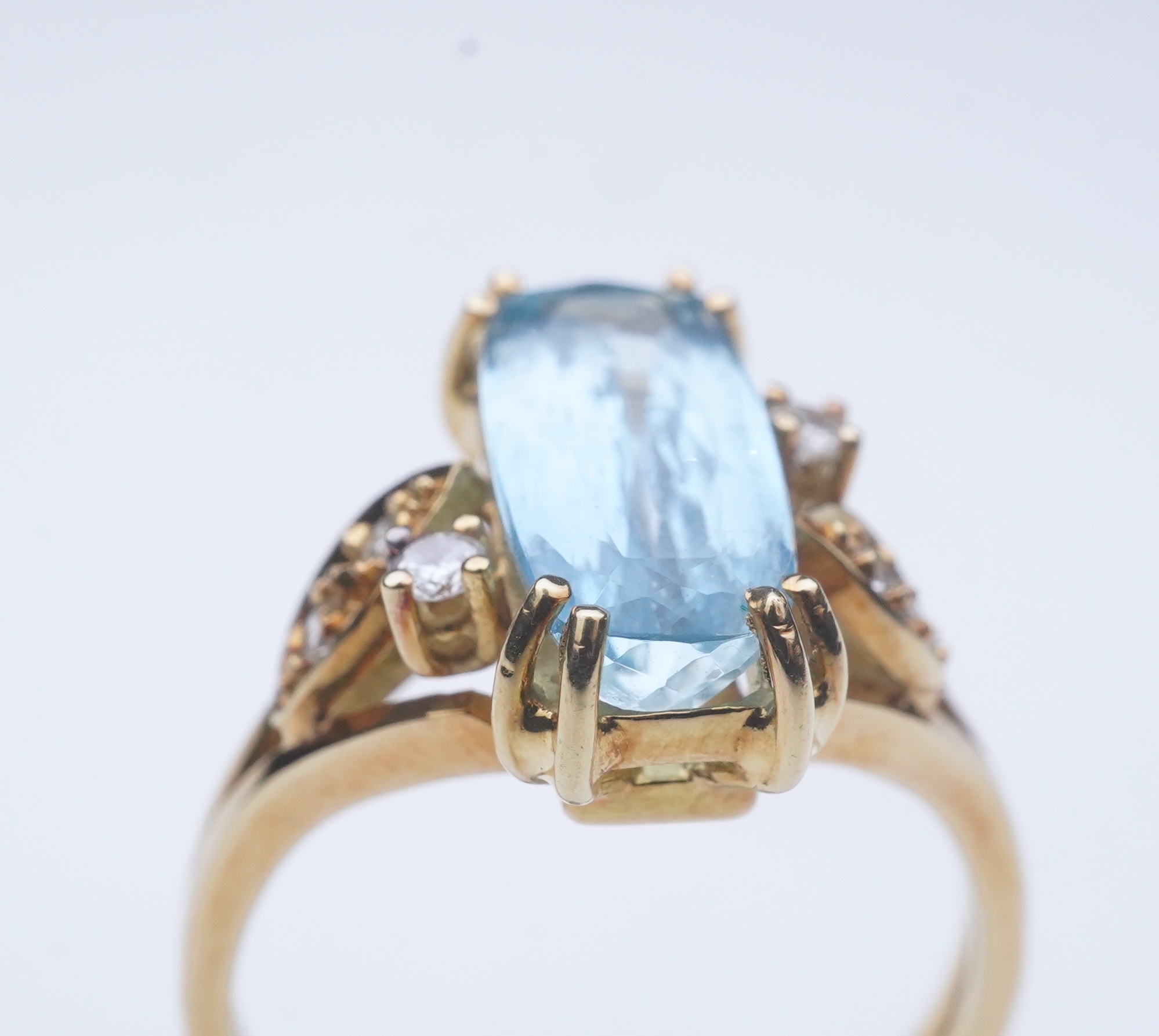 An aquamarine and diamond ring